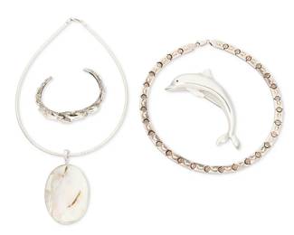 2211
A Group Of Sea-Themed Sterling Silver Jewelry
Late 20th century
Variously marked for maker and for sterling
Four works comprising three pieces with dolphin motifs including a sterling silver segmented link necklace, a Kabana sterling silver cuff bracelet with swimming dolphins, and a vintage sterling silver Bayanihan dolphin brooch as well as a Milor Italian sterling silver collar necklace with removable shell pendant, 5 pieces
Necklaces: 17.25" L x 0.25" H and 16" L x 3" H; cuff: 6.375" inner C x 0.5" H; brooch: 2.5" H x 3.75" W
129.9 grams gross
Estimate: $300 - $500