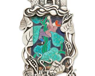2083
A Large Silver And Enamel Jack And The Beanstalk Brooch
Late 20th century
Unmarked
An elaborate silver brooch featuring a castle and vine tendrils surrounding a multicolored curved enamel plaque of Jack ascending the beanstalk
3.25" H x 1.5" W
44.5 grams gross
Estimate: $200 - $300