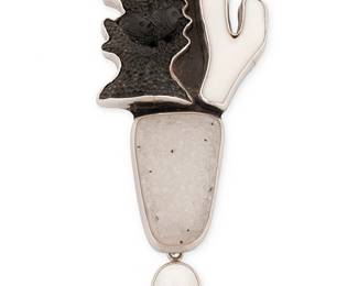 2059
An Amy Kahn Russell Sterling Silver Stacked Pendant/Brooch
Late 20th/21st century
Stamped: AKR / Sterling
Comprising a sterling silver stacked pendant/brooch with set carved onyx fish tableau, with white coral, grey drusy, and mabe pearl
4.25" H x 1.75" W
44.5 grams gross
Estimate: $200 - $400