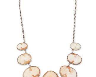 
2086
A Vintage Cameo Necklace
20th century
Chain stamped: Sterling
With seven graduated carved shell portrait cameos attached to a sterling silver chain
19" L x 1.625" H
37.9 grams gross
Estimate: $400 - $600