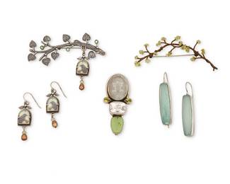 2188
A Group Of Studio Jewelry
Late 20th/21st century
Most marked for artist; further variously marked for sterling
Five works comprising a sterling silver Amy Kahn Russell pendant/brooch with hand-carved frog-motif crystal, set peridot, and agate drusy , as well as a Dawn Estrin and George Wilson sterling silver raven branch motif brooch with a raven window dangle and a pair of matching earrings, an unmarked Michal Michaud for Silver Seasons branch brooch, and a pair of Sikara sterling silver and set chalcedony long drop earrings; 7 pieces
Pendant: 2.38" H x 1.125" W; largest brooch: 2.25" H x 3" W; earrings: 2.125" H and 1.25' H
62.3 grams gross
Estimate: $400 - $600