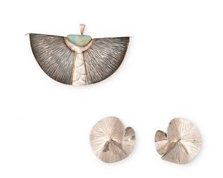 2048
A Group Of Modernist Sterling Silver Jewelry
Late 20th/21st century
Each marked for maker and for metal
Two works comprising a Wolf Dosch sterling silver and 18k gold textured half circle pendant brooch with set opal, together with a pair of Patricia Daunis textured sterling silver cone swirl earrings, 3 pieces
Pendant: 2.125" H x 3.75" W; each earring: 1.5" Dia.
50.8 grams gross
Estimate: $200 - $400