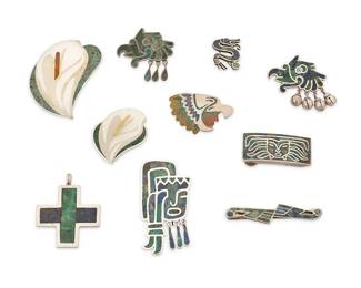 2221
A Group Of Los Castillo Mexican Silver And Stone Inlay Jewelry
Circa 1948-1965; Taxco, Mexico
Each stamped: Los Castillo / Taxco / Sterling / [design number]; further variously stamped: Hecho en Mexico / Made in Mexico / Mosaico Azteca / Metales Castillo / Metales Cas / DDS / [Eagle 15] / [Eagle 58] / Cooperativa / SCL / [design numbers]
Comprising seven sterling silver brooches including four with greenstone inlay, three with dangles or bells, all with stylized figural motifs such as serpents and eagles, as well as three further brooches in mixed metal and greenstone inlay, including two calla lilies and an eagle masked face brooch, together with a stone inlay cross pendant, a tie clip, and a Mosaico Azteca greenstone inlay belt buckle, 10 pieces
Largest brooch: 2.5" H x 2" W; smallest: 1" H x 1.25" W; pendant: 2.125" H; tie clip: 0.5 "H x 2.75" W; buckle: 0.875" H x 2.125" W
198.0 grams gross
Estimate: $200 - $400