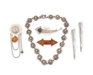 2218
A Group Of Silver Jewelry
Late 20th/21st century
Four marked for maker and for metal
Five works comprising three brooches, including a vintage Roz Balkin modernist sterling silver pin with snake chain accents, yellow gemstone, and hematite, a CR sterling silver modernist brooch with 14K gold accents, blue drusy and freshwater pearl, and a JS Art Deco-style sterling silver and amber brooch, a well as an unmarked chunky sterling silver and gold link necklace, and a pair of Mignon Faget modernist sterling silver clip earrings, each in the form of a grass leaf, 6 pieces
Largest brooch: 4" H x 1.5" Dia.; smallest: 1" H x 2.625" W; necklace: 18" L; each earring: 3.75" H
140.9 grams gross
Estimate: $500 - $700