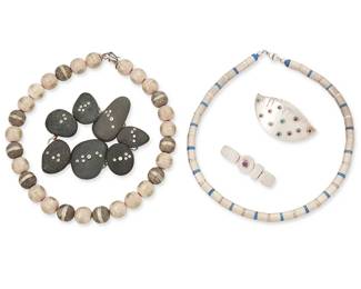 2165
A Group Of Modernist-Style Jewelry
Late 20th/21st century
Four marked for maker and for sterling
Five works comprising a Jan Suchodolski Mysterium sterling silver bead necklace with textured brushed silver beads, an unmarked Rosselini silver and lapis blue bead necklace, a Flying Anvil Lake Superior beach pebble and sterling silver link bracelet with set gemstones, a "Lisa" sterling silver modernist sculptural brooch with multiple set gemstones, and a signed sterling silver modernist brooch with set purple stone, 5 pieces
Necklaces: 17" L; bracelet: 7.5" L x 1.75" W; brooches: 1.375" H x 2.375" W and 0.625" H x 2" W
217.2 grams gross
Estimate: $500 - $700