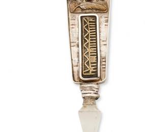 2044
A Susan Silver Brown "Desert Dominoes" Pendant/Brooch
Late 20th/21st century
Stamped verso: S.Silver Brown / Sterling / © / 14K; with further stamped inscription
An elaborate sterling silver and 14K gold mixed metal tall brooch with applied motifs and cut rock crystal point
4.375" H x 1.25" W
46.3 grams gross
Estimate: $200 - $400