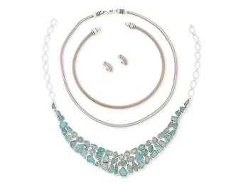 2160
A Group Of Silver Jewelry
Late 20th century
Two marked for maker and for sterling
Four works comprising a cluster set apatite bib collar necklace, a silver-toned metal snake chain, and an ESPO sterling silver mesh collar torque necklace with a pair of similar style earrings, 5 pieces
Necklaces: 22" L; 20.5" L x 1.5" H; 14.25" L; Each earring: 0.75" H
183.0 grams gross
Estimate: $300 - $500