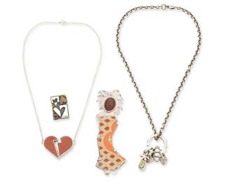 2213
A Group Of Silver And Stone-Set Jewelry
Late 20th/21st century
Three marked for maker; one unknown signature: RMM[?]/FS; one marked for sterling
Four works comprising a Kara Varian Baker chunky sterling silver charm necklace, a large signed figural pendant/brooch with ceramic tile "dress" and set fire opal, as well as an unmarked Frances Smersh sterling silver and tinted concrete "broken heart necklace, and a Far Fetched mixed metal heart motif pin, 4 pieces
Necklaces: 17.5" L x 2" H and 15" L x 1" H; pendant: 4" H x 1.5" W; brooch: 1.125" H x 0.75" W
103.2 grams gross
Estimate: $400 - $600