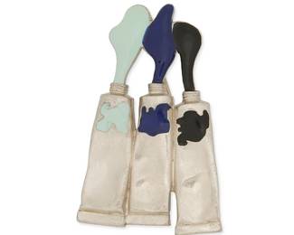 2114
A Fernandez Arman "Tubes De Peinture" Brooch
Fernandez Arman (1928-2005)
Circa 1995, France
Stamped signature to plaque verso; further stamped: © / 1996 / Armen
A silver-toned metal repoussé brooch with enamel accents designed as three paint tubes oozing black, navy and grey /blue paint
2.5" H x 1.5" W
Estimate: $200 - $300