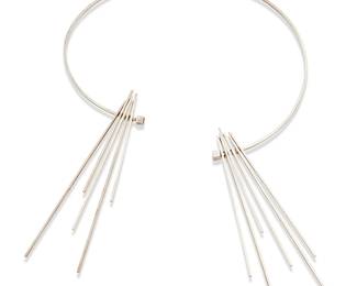 2037
A Betty Cooke Sterling Silver Kinetic Necklace
Betty Cooke (b. 1924)
Early 21st century
Stamped: Cooke / Sterling
A modernist dynamic collar necklace designed with a thin square wire collar suspending multiple moveable square wire "spikes" of various lengths
17" L x 5.5" H
47.9 grams
Estimate: $1,200 - $1,800