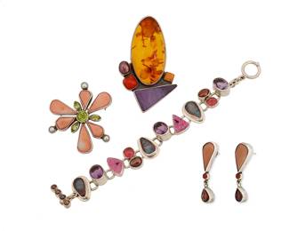 2111
A Group Of Sterling Silver And Set Stone Jewelry
Late 20th/21st century
Each marked for maker and for sterling
Four works in sterling silver comprising three by Echo of the Dreamer, including a set stone, pink drusy and pearl link bracelet, a set gemstone floral brooch, and a pair of earrings as well as an Amy Kahn Russell pendant/brooch with large set amber, sugalite, coral and pearl, 5 pieces
Bracelet: 7" L; brooch: 2" Dia.; each earring: 1.75" H; pendant: 3" H x 1.75" W
107.3 grams gross
Estimate: $500 - $700