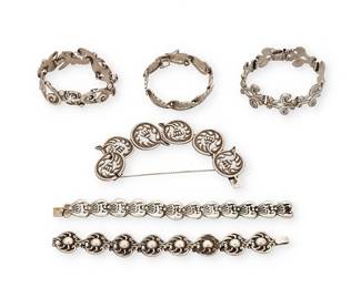 2202
A Group Of Los Castillo Silver Bracelets
Circa 1940-1945 and1948-1962; Taxco, Mexico
Each variously stamped: Los Castillo / Taxco / Sterling / Made in Mexico / Hecho en Mexico / [Eagle 15] / [Design numbers: 183 / 494 / 853 / 440]
Comprising six Mexican sterling silver link bracelets in various incised and applied scrollwork and foliate designs, 6 pieces
Largest: 8" L x 1.25" H; smallest: 7" L x 0.875" H
226.0 grams
Estimate: $400 - $600