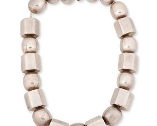 2081
A Chunky Silver Necklace
Mid/late 20th century
Unmarked
Comprised of large alternating round and six-sided beads
20.5" L x 1" H
251.3 grams
Estimate: $200 - $400