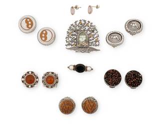 2151
A Group Of Sterling Silver And Set Gemstone Jewelry
Late 20th/21st century
Variously marked for maker and for sterling
Eight works comprising two brooches including a "thorn tree" picture brooch by Dawn Estrin/George Wilson with set gemstones, and a small cut onyx and pearl pin, as well as six pairs of set stone earrings by various makers including Biba Schutz, Rebecca Collins and Ford Forlano, 14 pieces
Brooches: 1.5" H x 1.5" W and 0.375" H x 1.25" W; largest earring: 0.875" H; smallest: 0.5" H
67.1 grams gross
Estimate: $1,000 - $1,500
