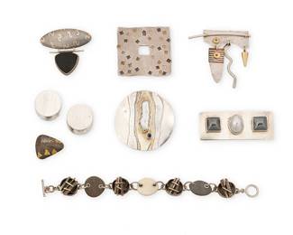 2166
A Group Of Modernist-Style Jewelry
Late 20th/21st century
Seven marked for maker; six marked for sterling
Eight works comprising six brooches including a small Sydney Lynch sterling silver pebble brooch, a Roper sterling silver, 18k gold, and onyx articulated brooch, a Jan Suchodolski brushed sterling silver square brooch, a Michou Paris sterling silver pendant/brooch with set freshwater pearl, a signed sterling silver rectangular brooch with mabe pearl and set stones, and an unmarked textured sterling silver, copper and gold brooch with dangles, as well as a silver and resin stone link bracelet and a pair of Angela Cummings chunky brushed sterling silver earrings, 9 pieces
Brooches: Largest: 2.125" Dia.; smallest: 0.75" H x 1" W; Bracelet: 7" L; earrings: 1" Dia.
124.5 grams gross
Estimate: $600 - $800
