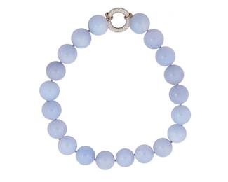 2058
A Chalcedony Bead Necklace
Late 20th/21st century
Unmarked
A chunky pale blue chalcedony bead necklace with a silver-toned metal diamanté clasp
18.5" L x 0.875" Dia.
229.9 grams gross
Estimate: $300 - $500
