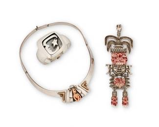 2102
A Group Of Salvador Terán Jewelry
Salvador Teran (c. 1920-1974)
Circa 1955-1970; Mexico City, Mexico
Each stamped: Salvador / Mexico / [Design number]; further variously stamped: Sterling / [Eagle 36] / Marbel S.A.
Comprising two works in sterling silver including a hinged collar necklace with carved stone figural center plaque, a hinged cuff bracelet with moon and star overlay motif, and a Marbel silver pot metal Aztec-inspired pendant with set pink ceramic jaguar mask motif accents, 3 pieces
Necklace: 15" L x 1.25" H; cuff: 6.25" inner C x 1.625" H; pendant: 6" H x 2" W
Weighable silver: 133.4 grams gross
Estimate: $600 - $800