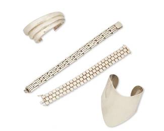 2019
A Group Of Sterling Silver Modernist Bracelets
Late 20th/21st century
Each marked for maker and for sterling
Four works comprising a Celia Sebiri sterling silver V-shaped cuff, a Bayanihan sterling silver cuff with organic tapered stacks, an Auurace chunky sterling silver stepped link bracelet, and a sterling silver jubilee-style link bracelet with clasp, 4 pieces
Cuffs: 6.5" inner C x 2" H and 6.5" inner C x 1.25" H; links: 8.375" L x 0.5" H and 7" L x 0.75" H
240.7 grams gross
Estimate: $500 - $700