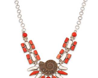 2130
A Sterling Silver And Set Stone Necklace
Late 20th/21st century
Marked for sterling
An elaborate red and white bib necklace with cluster-set branch coral, freshwater pearls, red stone cabochons and central fossilized ammonite
21.25" L x 2.75" H
87.6 grams gross
Estimate: $300 - $500