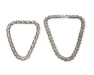 2146
A Group Of Hector Aguilar Mexican Silver Jewelry
Hector Aguilar (1905-1986)
Circa 1940-1945 and 1953-1962; Taxco, Mexico
Each stamped: HA [conjoined] / Taxco / 940; one further stamped: [Eagle 9]
Two works in sterling silver comprising a chunky necklace of incised clipped "coin" links with raised hook elements, and a rectangular hook-form necklace will ball accents, 2 pieces
Larger: 21.25" L x 0.625" H; smaller: 17.5" L x 0.5" H
174.6 grams
Estimate: $500 - $700