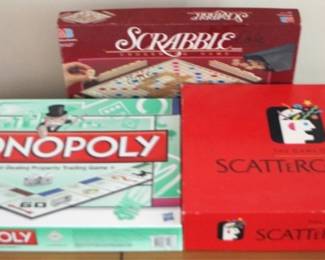 103 - 3 Board Games includes Monopoly and Scrabble
