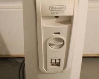 392 - Space Heater - 25" x 12" x 6" You are buying a used as-is electric/electronic item. We do not guarantee all components are present, and if it is not expressly stated, it is untested.
