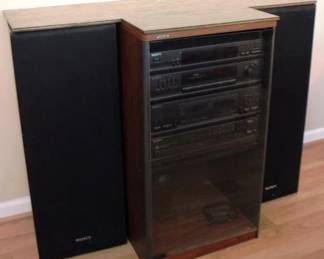 104 - Sony Stereo Stand w/ Speakers (Radio/CD/Cassette) 35" x 46" x 21"
