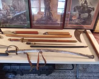 THE SWORD IN FRONT IS A REPRODUCTION