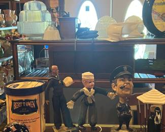 Bobble head policeman
Celluloid head sailor
Cardboard ice cream container