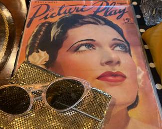 Picture play magazine
Gold mesh purse
Vintage sunglasses