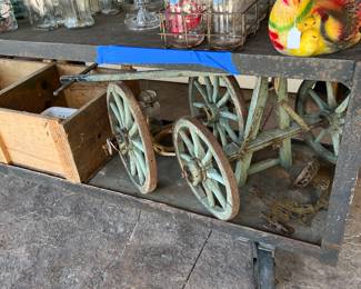 Goat wagon wheels
Glass milk bottles in metal holder
Metal cart ( not for sale )