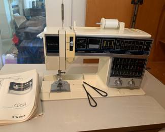 Singer sewing machine in the cabinet