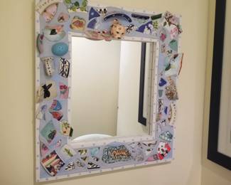 Colorful mosaic mirror with feline head