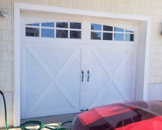 Handsome carriage house style garage doors