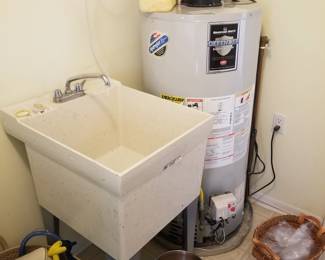 Laundry sink; 50-gallon GAS hot water heater