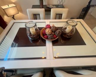 This modern style beauty from last week's sale is still available.  Sofia Vagaro "Savona".  Table measures 72" - 86"L x 42"W x 30"H. Message me to view in Breakaway Trails. The set WILL NOT be present at the estate sale. 