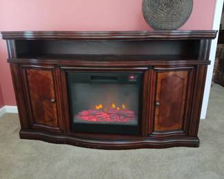This is a beautiful solid wood TV stand, with one of those faux fireplace electric heaters.  Excellent condition!  If interested, feel free to text for more information, additional pics, dimensions, or to schedule an appointment for private, on-site viewing.  $125 OBO.
Thanks!
Aaron
901-568-6970 (Text preferred)