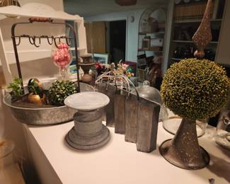 Metal works, trays galore, faux topiary 