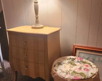 Painted small dresser. Lamps galore!
Wicker stool