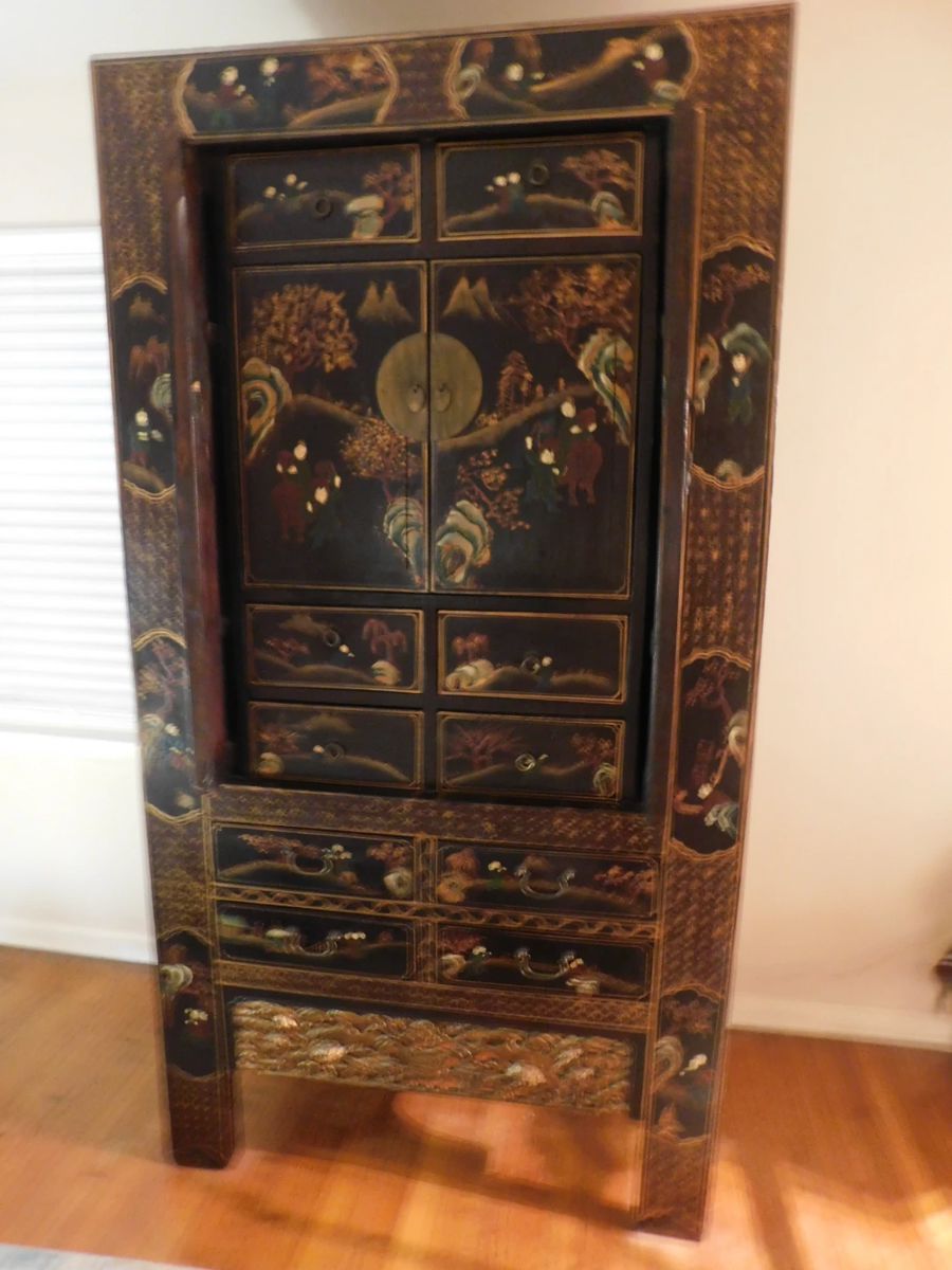 Large Asian cabinet, circa 1860 w/100 Children hand painted design.  This cabinet has multiple drawers, two sets of doors and a large open space inside to keep treasured items.  Dimensions 84"H x 45"L x27"D.  SELLING FOR $350.00.