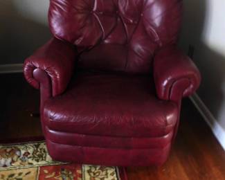 The red recliner.  The color is darker than chair actually is.  Light plays a part in this.