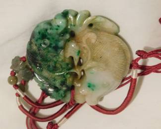 Jade Amulet.  Two carps swimming head to tail.