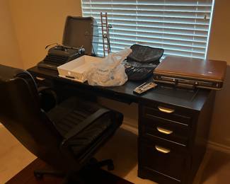 Desk, briefcase, office chair