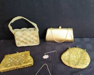 Set 5 of Shiny, Gold Colored Handbags 