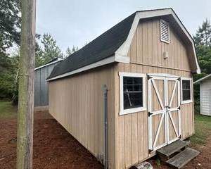 12'X24' Storage Building,  Wired with electrical boxes, AC, Has Built in Shelves and Work Benches13'6" Tall. Must be moved by October 15th