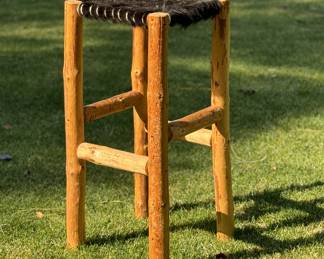 Pair of wood/cowhide barstools 