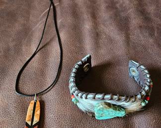 Signed pendant & leather cuff bracelet