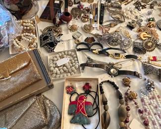 Beaded necklaces, vintage purses, old watches, disney collectibles