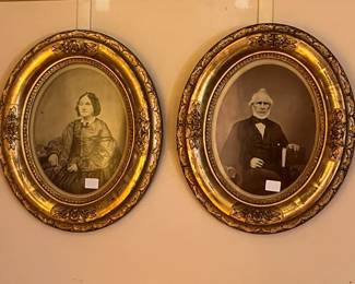 pair of antique framed portraits