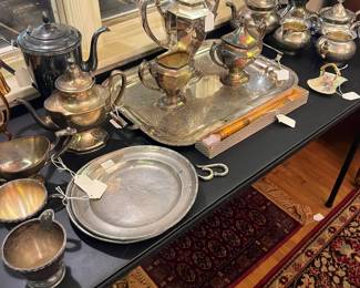 silverplate tea set and antique pewter plates